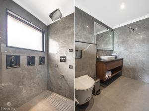 a bathroom with a toilet and a sink and a window at Paradise Hotels in Pahalgām +28 photos