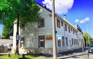 a building on the side of a street at Hotel Moji 5 Solingen in Solingen
