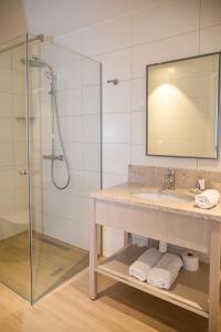 a bathroom with a sink and a shower at Šangulin Palace M in Biograd na Moru +31 photos