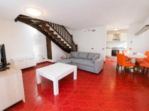 a living room with a couch and a table at La Casa del Mare in Caorle