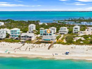 an aerial view of a resort on a beach at Pet Friendly Beachfront Home - Casa Bella Del Sol in Cape San Blas
