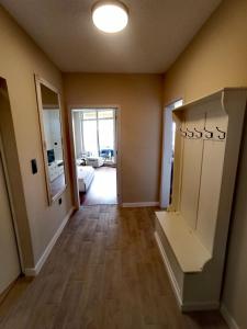 a hallway with a living room and a living room with at DL Apartments in Aheloy
