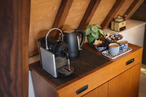 a coffee maker on a counter in a room at Koffie&kussens in Middelburg