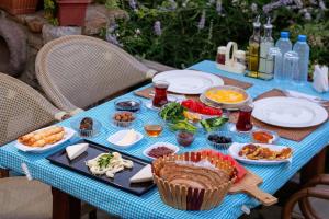 a blue table with food on top of it at kastro konak in Gokceada Town