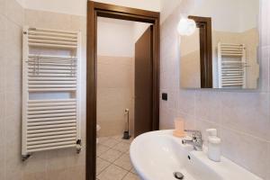 a bathroom with a sink and a mirror at Terraluna in Monforte dʼAlba +50 photos