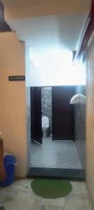 a bathroom with a toilet and a sink at hotel grand vk #Ac family rooms#free wifi#free parking in Agra