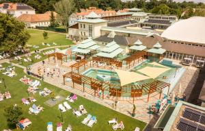 an aerial view of a resort with a swimming pool at Óvár Apartman in Mosonmagyaróvár