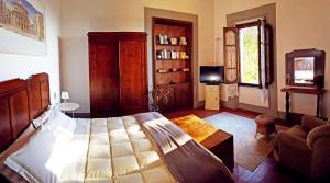 Televisyen dan/atau pusat hiburan di Alloggi in Villa storica