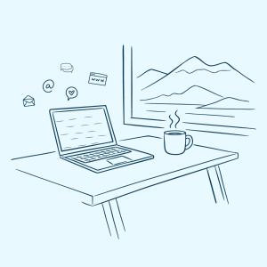 a laptop sitting on a table with a coffee cup at Alfa Room - The LOWFO House Lofoten in Moskenes