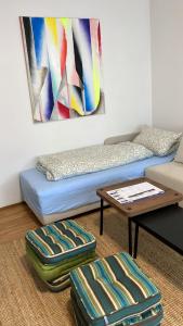 a living room with a couch and a coffee table at Urlaub in den Bergen in Puchberg am Schneeberg