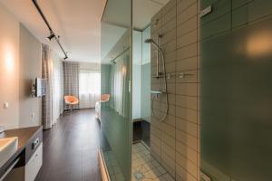 Koupelna v ubytování Hotel Papendal + 34 fotografií
