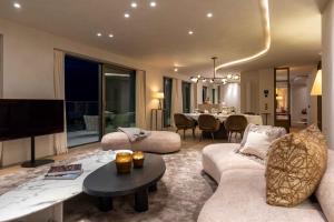 a living room with a couch and a table at O'Ciel 24 - Exceptional 24th floor Residence - Ostend in Ostend