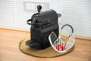 a black blender sitting on top of a table at Domus Luna in Teulada