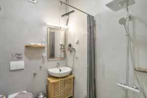 a bathroom with a sink and a shower at Villa Pilali in Kefallonia +30 photos