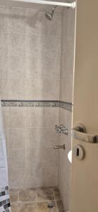 a bathroom with a shower with a sink at Continental Hotel in Miramar +210 photos