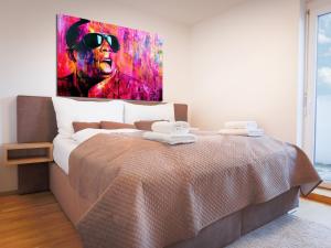 Posteľ alebo postele v izbe v ubytovaní SKY9 Penthouse Apartments
