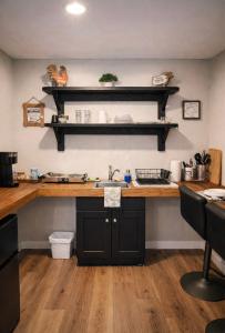 a kitchen with a counter and a sink at Western Studio in Houston