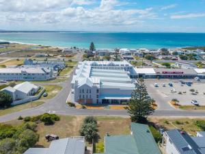 an aerial view of a town next to the ocean at Alwil Apartment 11 in Struisbaai