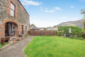 an external view of a house with a yard at 1 Bed in Keswick oc-28382 in Braithwaite