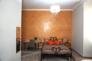 Postel nebo postele na pokoji v ubytování Residence Stendhal Guest House