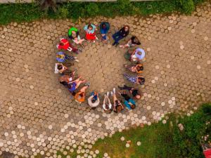 a group of people standing in a heart shape at Guest House Mokvare in Gundauri +48 photos