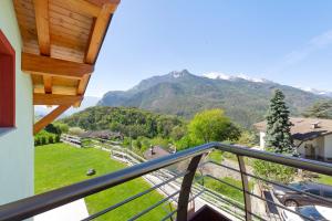 a balcony with a view of a mountain at Appartamenti Suly 3 - Cir0084 in Saint Vincent