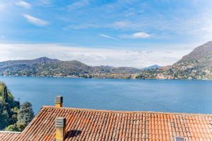 a view of a lake from the roof of a house at LEtoile du Lac in Blevio