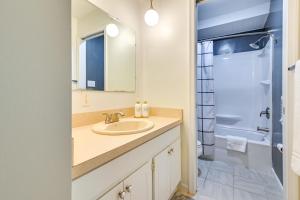 a bathroom with a sink and a shower at Mountain Maryland Adventures Await in McHenry +18 photos