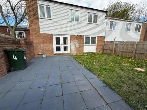 a driveway in front of a house with a fence at The cumbria place in Elswick