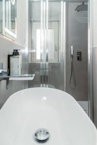 a bathroom with a shower and a sink at Il borgo di Ulisse in Gaeta +82 photos