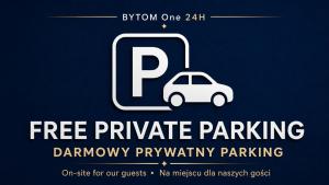 a white car is coming out of a cell phone at BYTOM One 24H Strefa Komfortu in Bytom