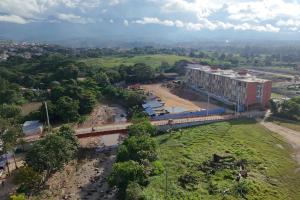 an overhead view of a bridge over a river with a building at Comfortable Appartment with Free Parking in Tarapoto