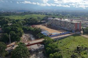 an aerial view of a building next to a river at Spacious and Comfortable Apartment with Parking in Tarapoto