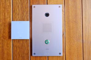 a metal switch on a wooden wall at Ben Shea Smart Home in Dufftown