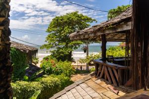 a house with a view of the beach at Beach House NATUREZA self check-in in Itacaré