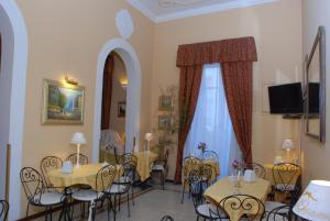 TV a/nebo společenská místnost v ubytování Hotel del Centro