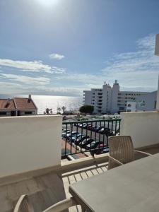 a balcony with a view of the ocean at Valdés in Callao Salvaje +11 photos