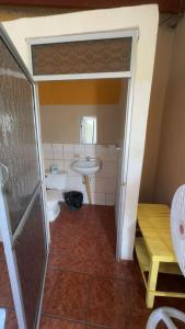 a bathroom with a toilet and a sink at Accommodation in Copán Ruinas #5 in Copán Ruinas