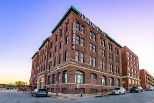 a large brick building with a sign on it at Drury Plaza Hotel St Louis Union Station in Saint Louis