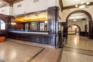 a lobby with a bar in a building at Drury Plaza Hotel St Louis Union Station in Saint Louis