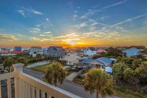 a view from a balcony of a residential neighborhood at The Island Sandpiper by Oak Island Accommodations in Oak Island