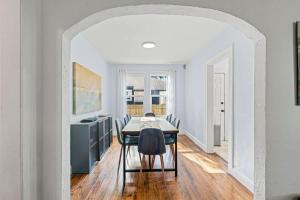 a dining room with a table and chairs at Belote Place Bungalow in Jacksonville