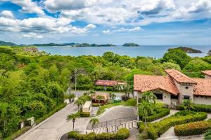 an aerial view of a house with the ocean in the background at Villas Catalina 7 in Potrero