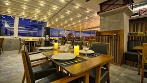 a dining room with a table in a restaurant at Samir Deluxe Hotel in Istanbul