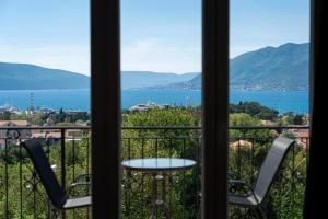 a view from a room with a view of the water at Adriatic Nest Residence in Tivat +33 photos