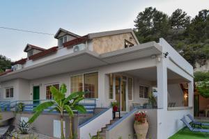 a house with a view of the front of it at Monte Mare Rhodes in Ixia