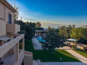 an aerial view of a house with a swimming pool at Seliandros Aura Villa in Dhiminión