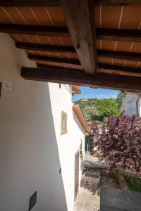 a view of an alley from a building at Il Pozzo degli Angeli in Cortona +53 photos