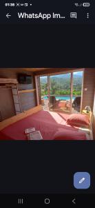 a page of a bedroom with a bed and a window at Sole d'Oro in San-Nicolao +51 photos