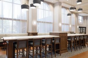 a conference room with a long table and chairs at Hampton Inn & Suites Boise-Meridian in Meridian